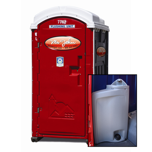 Exterior of red, white, and blue portable toilet with sink inside